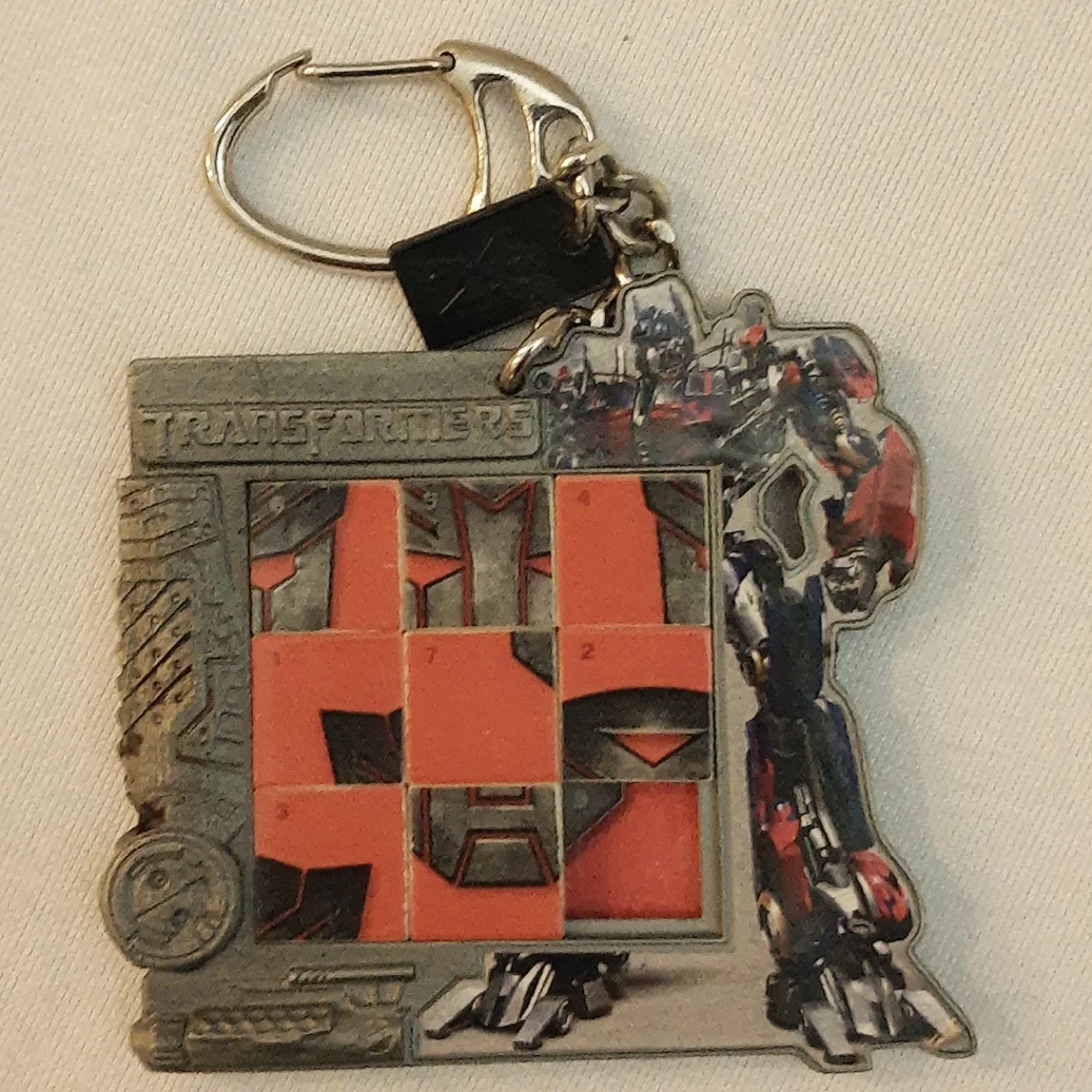 Transformers Miniature Slide Puzzle Keychain Autobot Symbol 2007